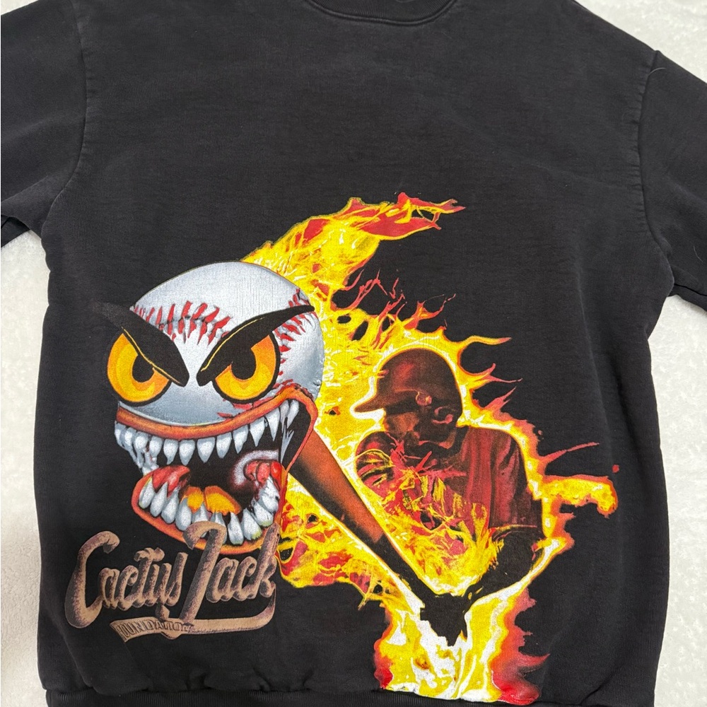 Cactus Jack Black Crewneck Sweater with Urban Graphic Flair